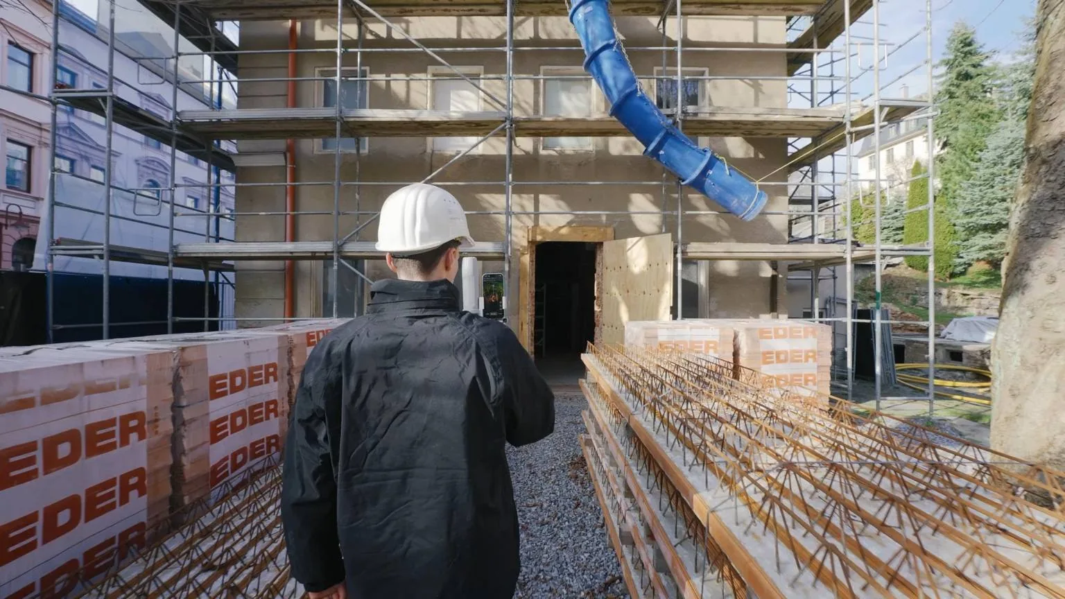 FJD Trion operator documenting an outdoor construction project